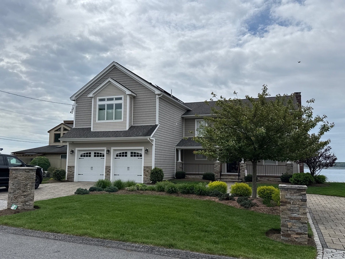 After — Warwick Landmark PRO Roof, VELUX Skylights, Everlast Siding and Seamless Gutters