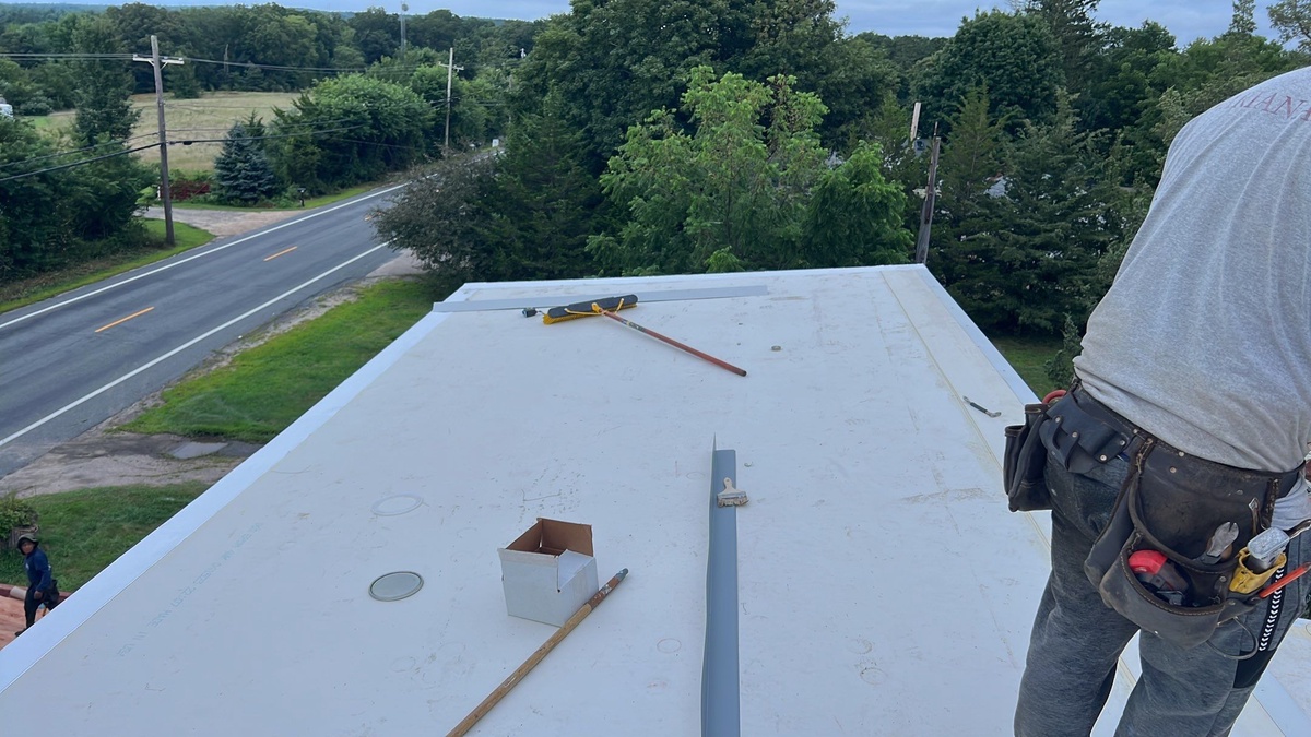 Class 4 Shingles Plus a White EPDM Flat — NorthGate ClimateFlex in Moire Black for a Richmond, RI Property