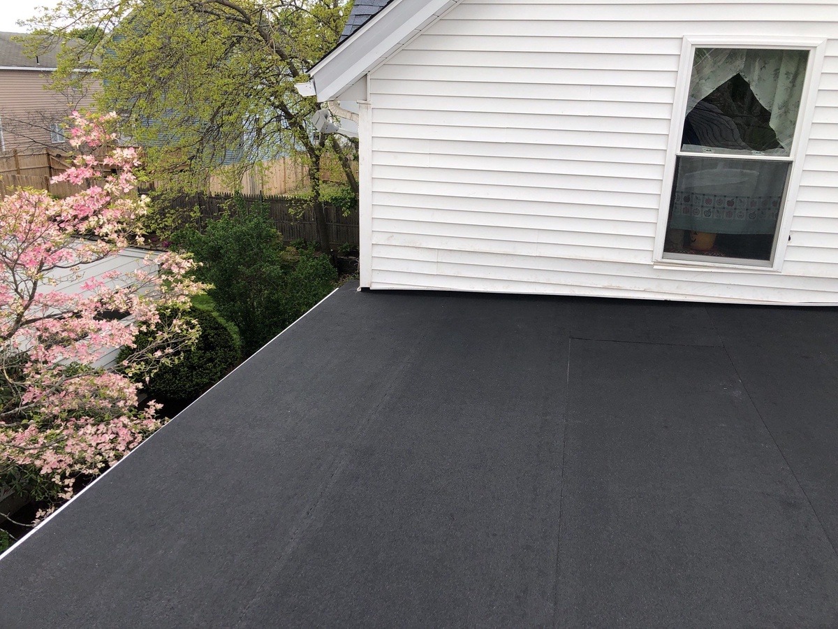 After — Two Roofs in One — OC Duration Harbor Blue and a Mule-Hide Low-Slope System After Storm Damage in Providence, RI