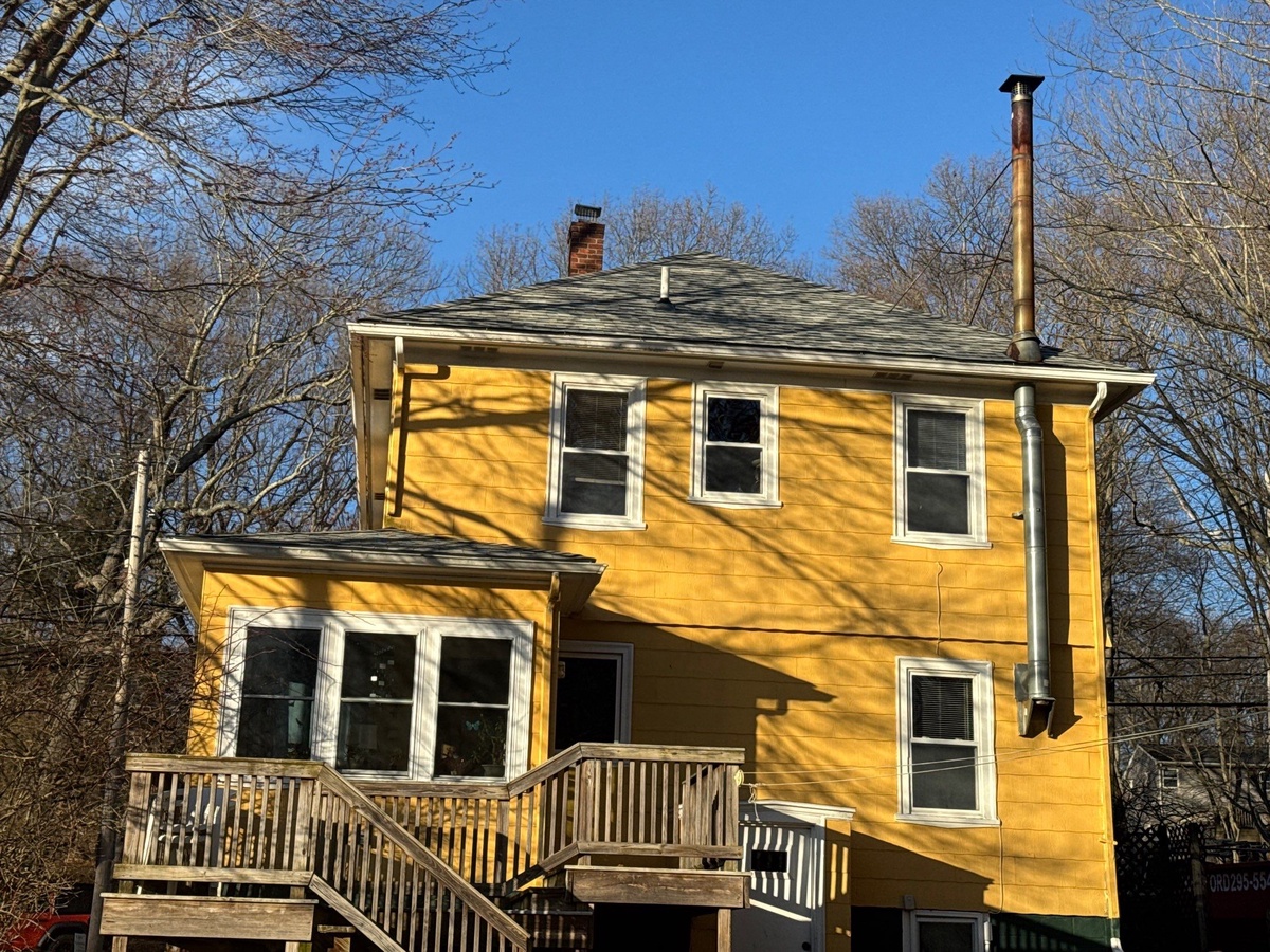 After — Three Roofs, One Property — House, Garage, and a Stone Springhouse in Landmark Cobblestone Gray, West Warwick, RI