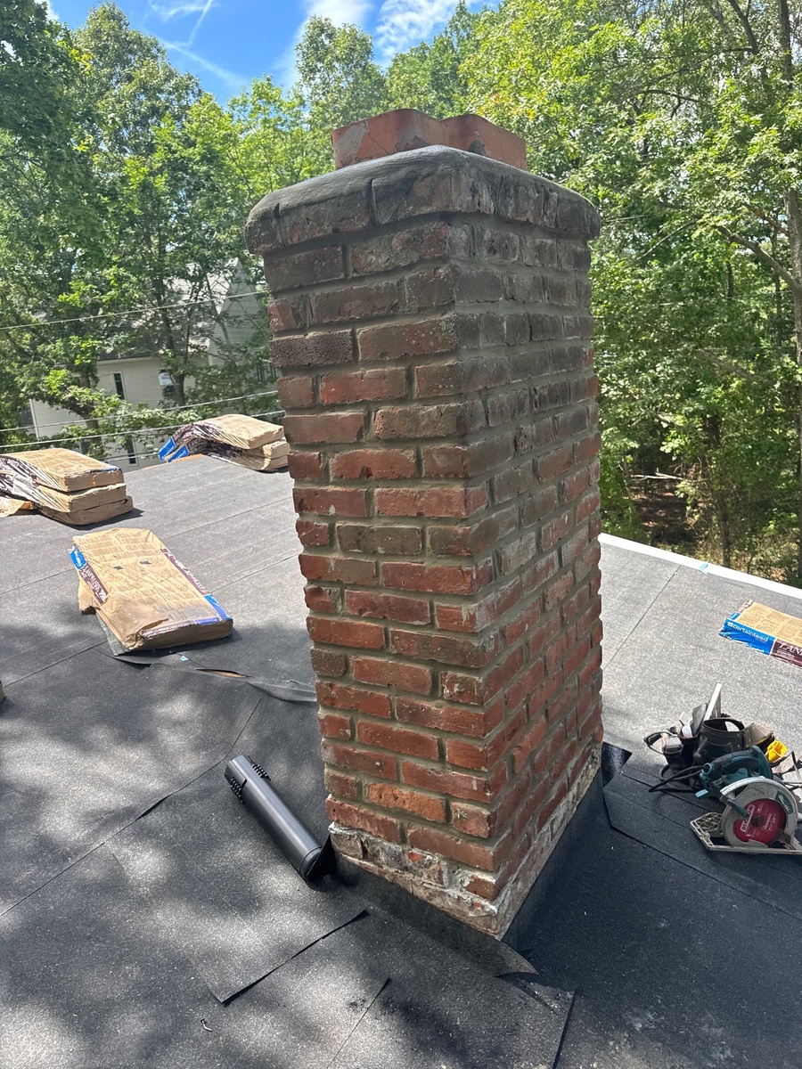 The Repair Most Roofs Actually Need — Chimney Flashing Rebuilt on a Landmark PRO Roof in North Kingstown, RI