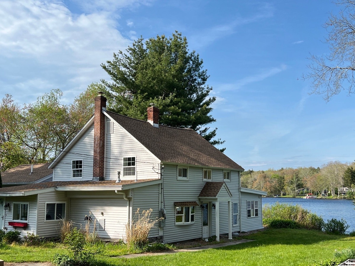 After — Hopkinton, RI Roof Repair: GAF Timberline HDZ Shakewood, Mod-Bit Low-Slope, Chimney & Siding