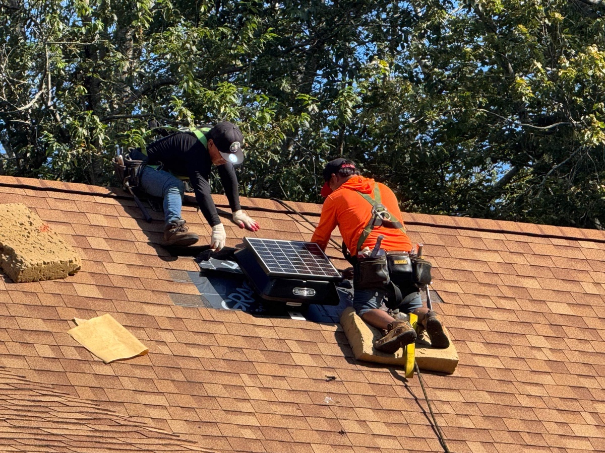 Crew installing VELUX skylight East Greenwich RI