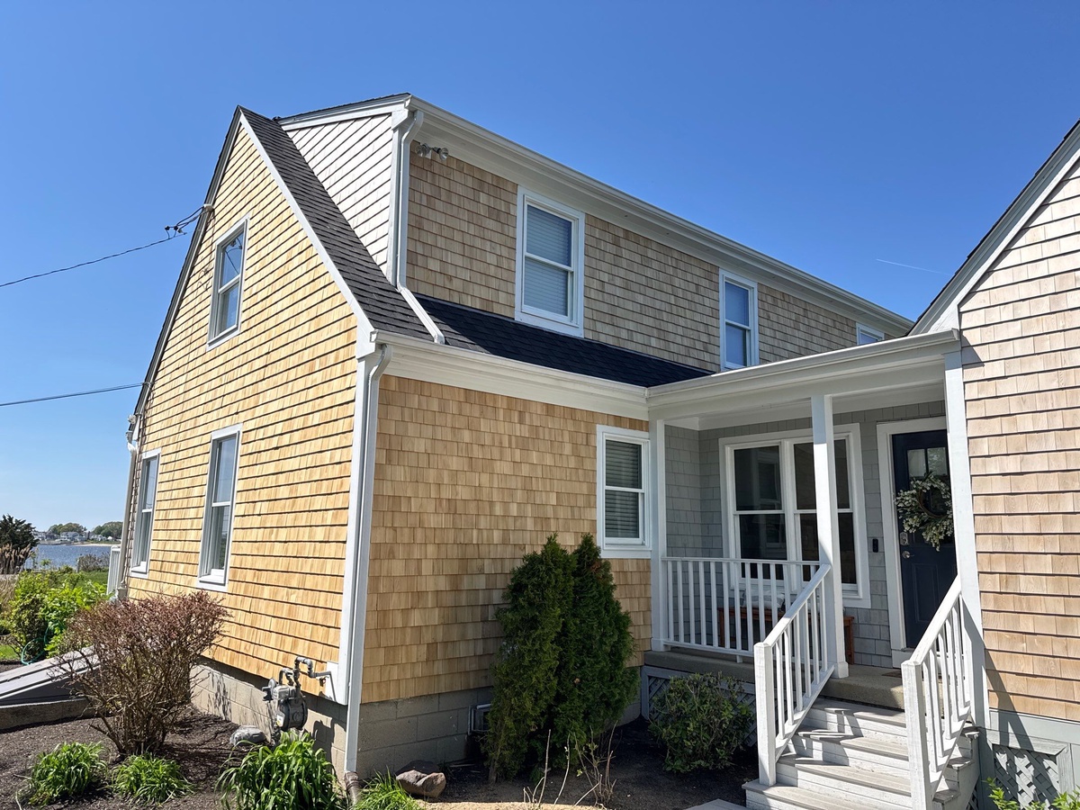 New cedar shake siding installed Barrington RI exterior project