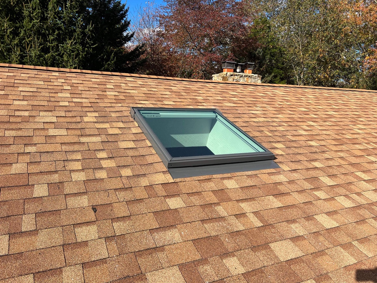 VELUX fixed skylight with solar blinds on Resawn Shake roof East Greenwich RI