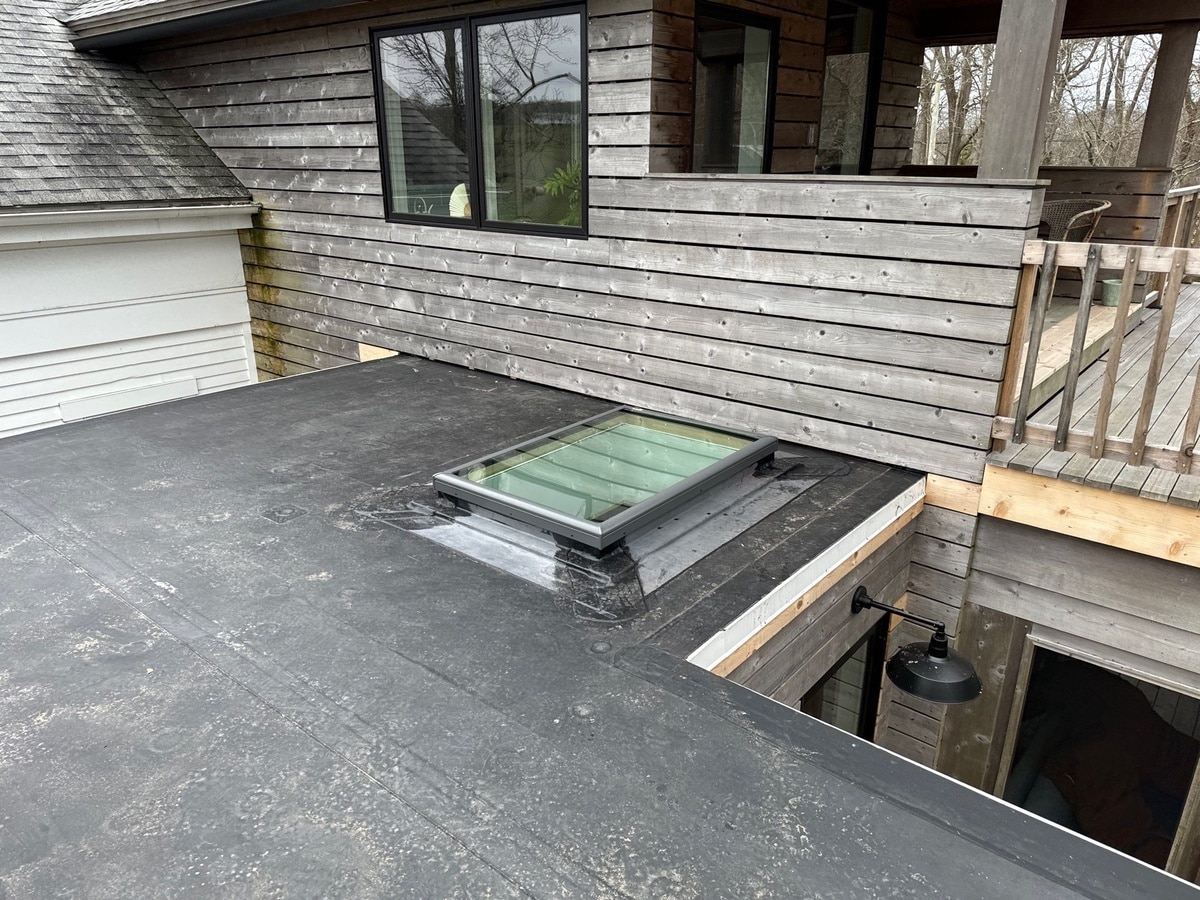 EPDM membrane roof with new VELUX fixed skylight, Tiverton