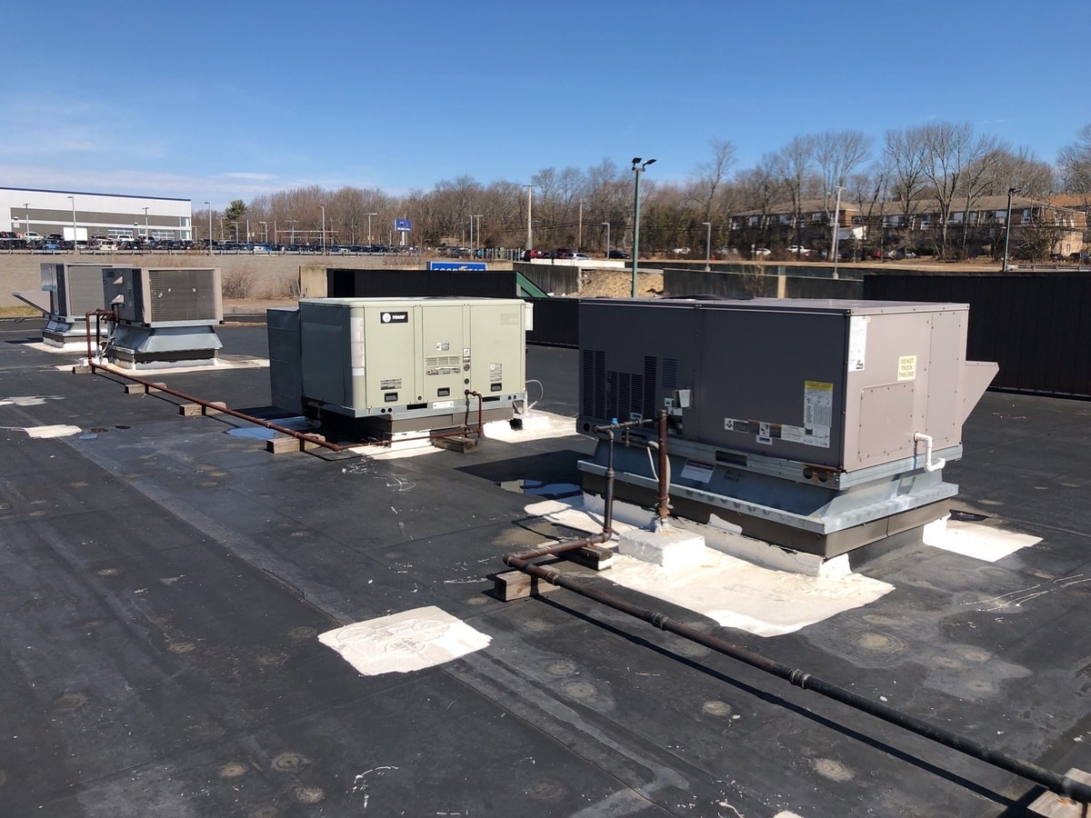 West Warwick, RI Commercial Roof Repair: Silicone Restoration Over the Quaker Valley Mall