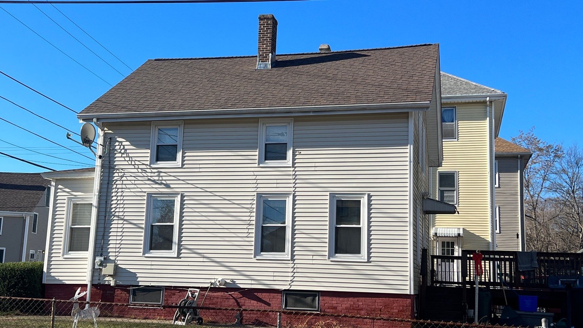 After — Insurance Claim Plus Chimney Flashing — CertainTeed Landmark in Heather Blend for a Pawtucket, RI Home