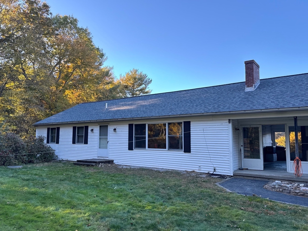 After — West Greenwich, RI Roof Replacement in CertainTeed Landmark Colonial Slate on a Wooded Ranch