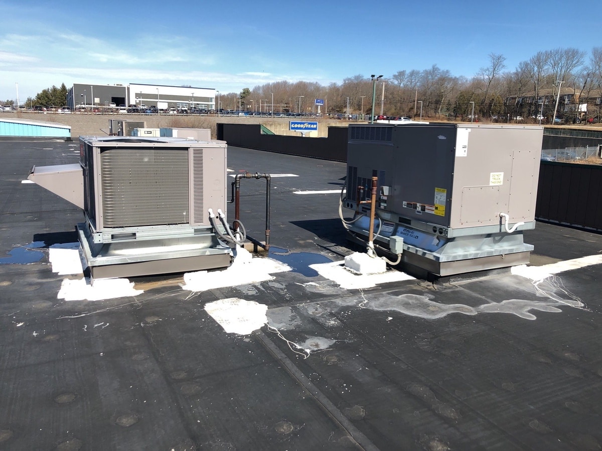 After — West Warwick, RI Commercial Roof Repair: Silicone Restoration Over the Quaker Valley Mall