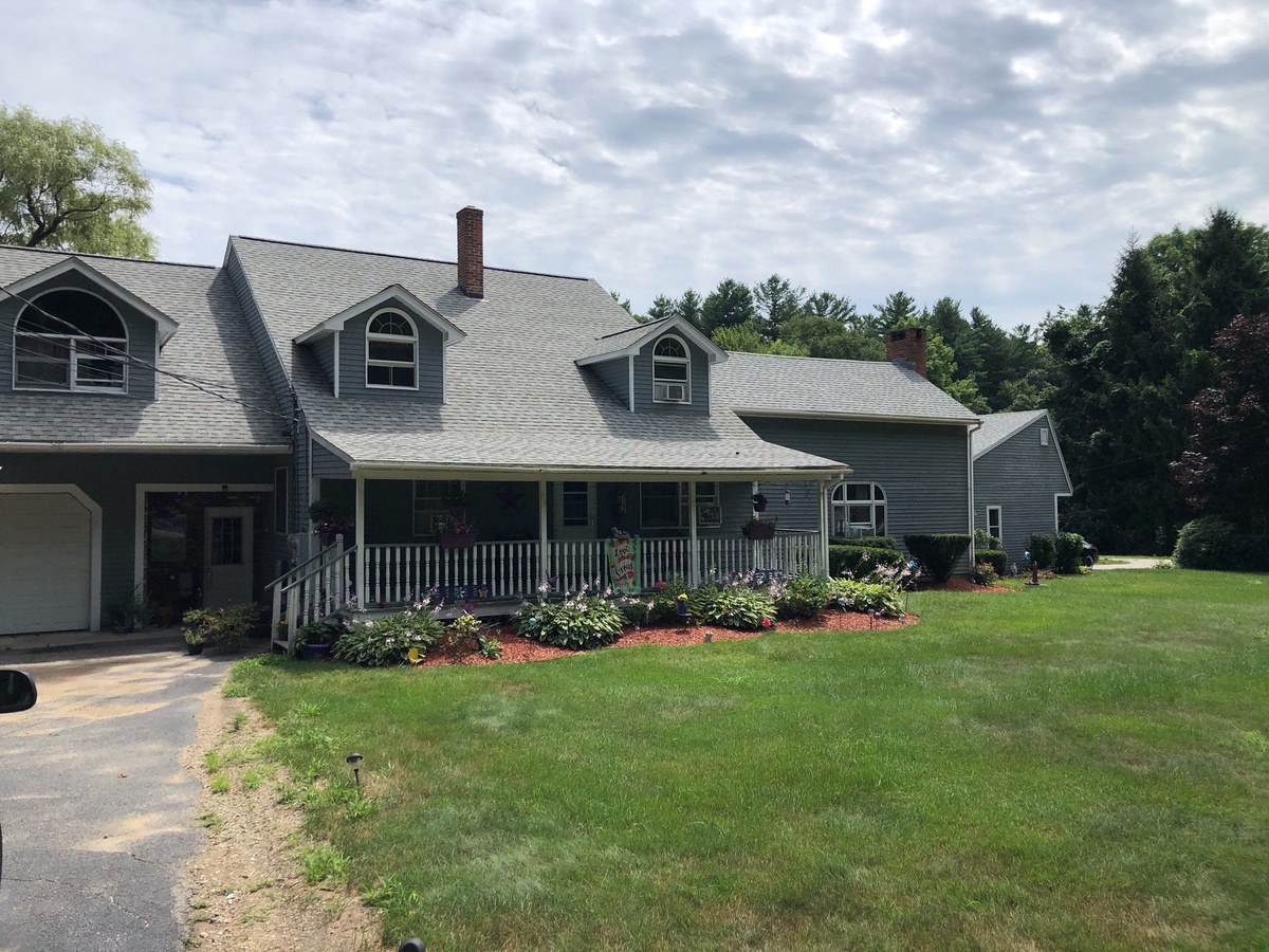 After — Storm Damage Restored in North Smithfield, RI — Landmark PRO in Max Def Cobblestone Gray Plus a Venting Skylight