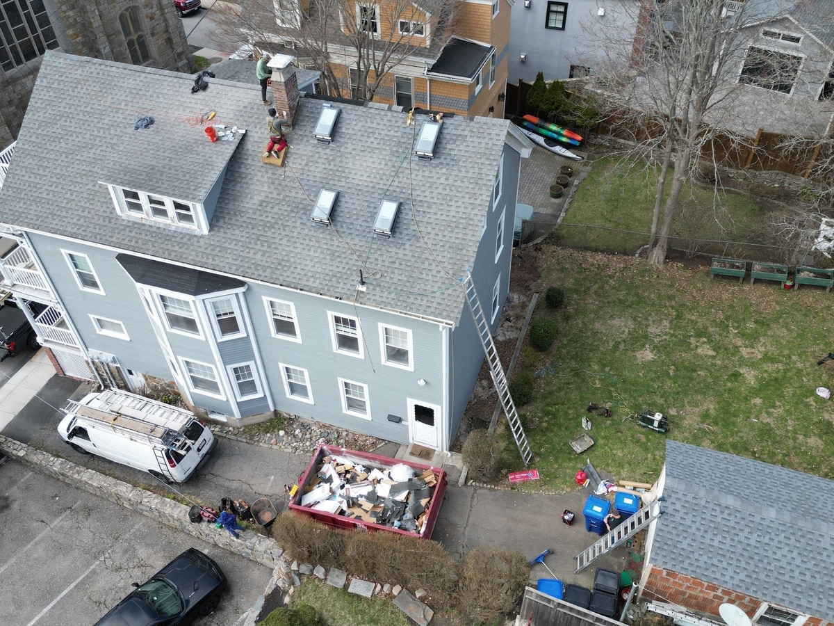 Newport, RI Roof Repair: Chimney Rebuild, VELUX Skylights & Solar-Powered Venting