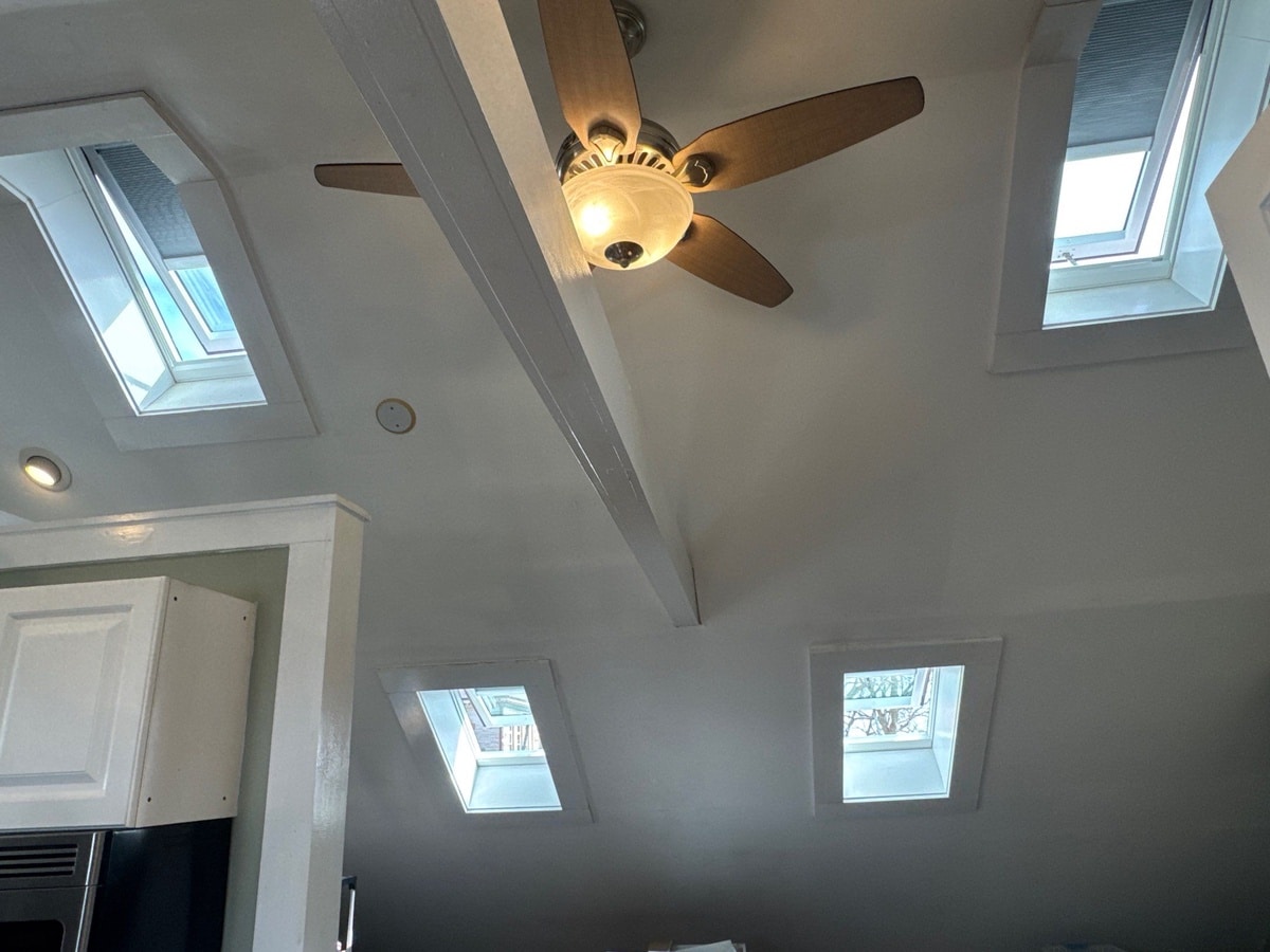 Interior VELUX skylights brighten Newport cathedral-ceiling room
