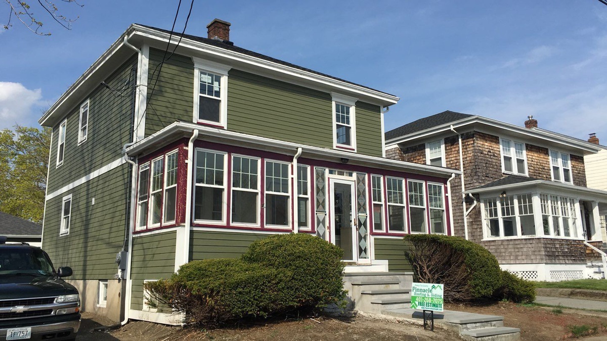James Hardie Mountain Sage lap siding detail on Newport RI home by Pinnacle Roofing