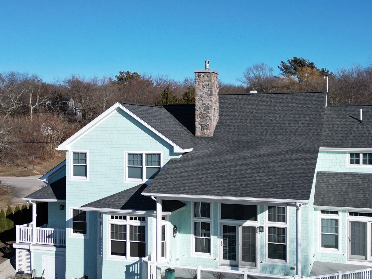 Close-up of James Hardie shake shingle siding and Landmark PRO Pewterwood roof in Jamestown RI