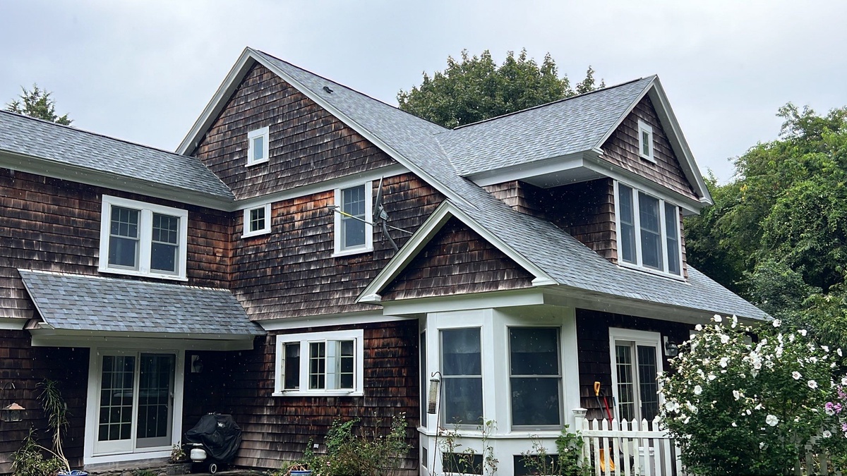 Quarry Gray shingle color complementing weathered cedar siding Jamestown Rhode Island