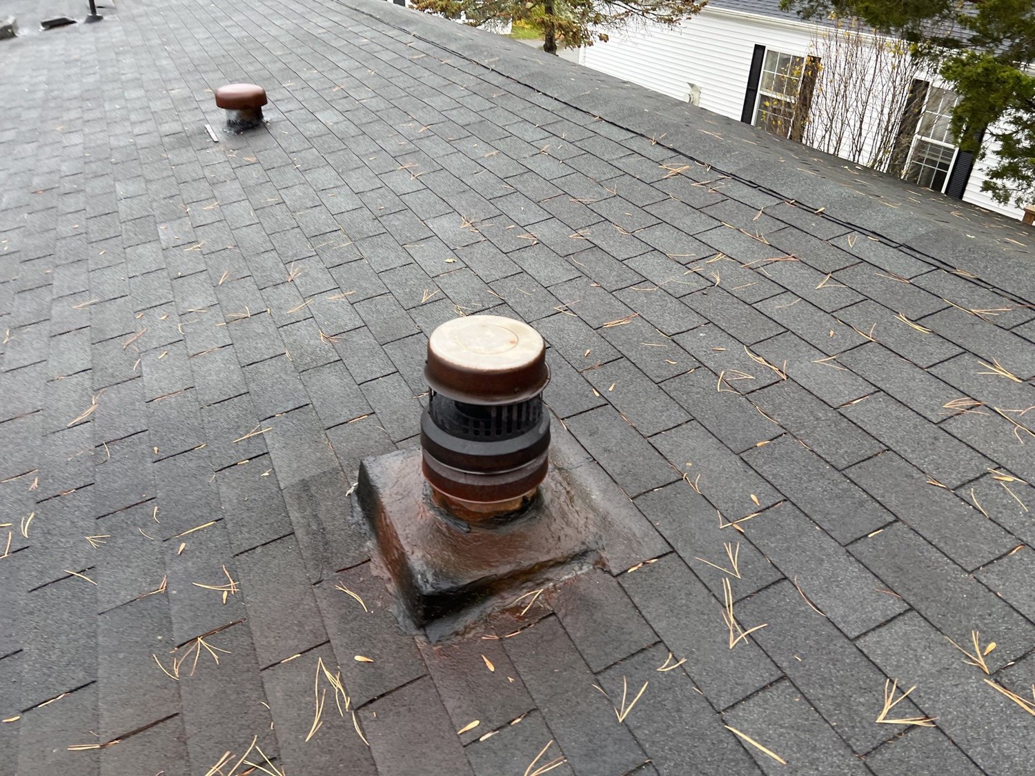 A Balanced-Ventilation Roof in CertainTeed Landmark Moire Black — East Greenwich