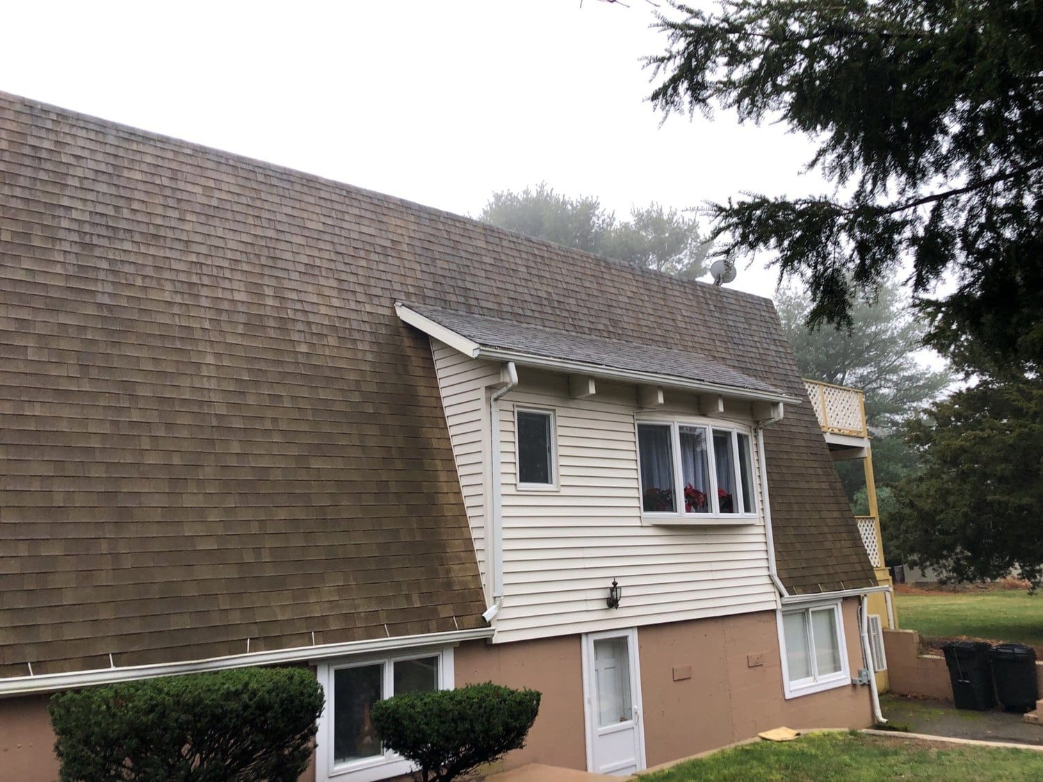 After — Wind-Storm Roof Restoration in Jamestown — CertainTeed Landmark Heather Blend