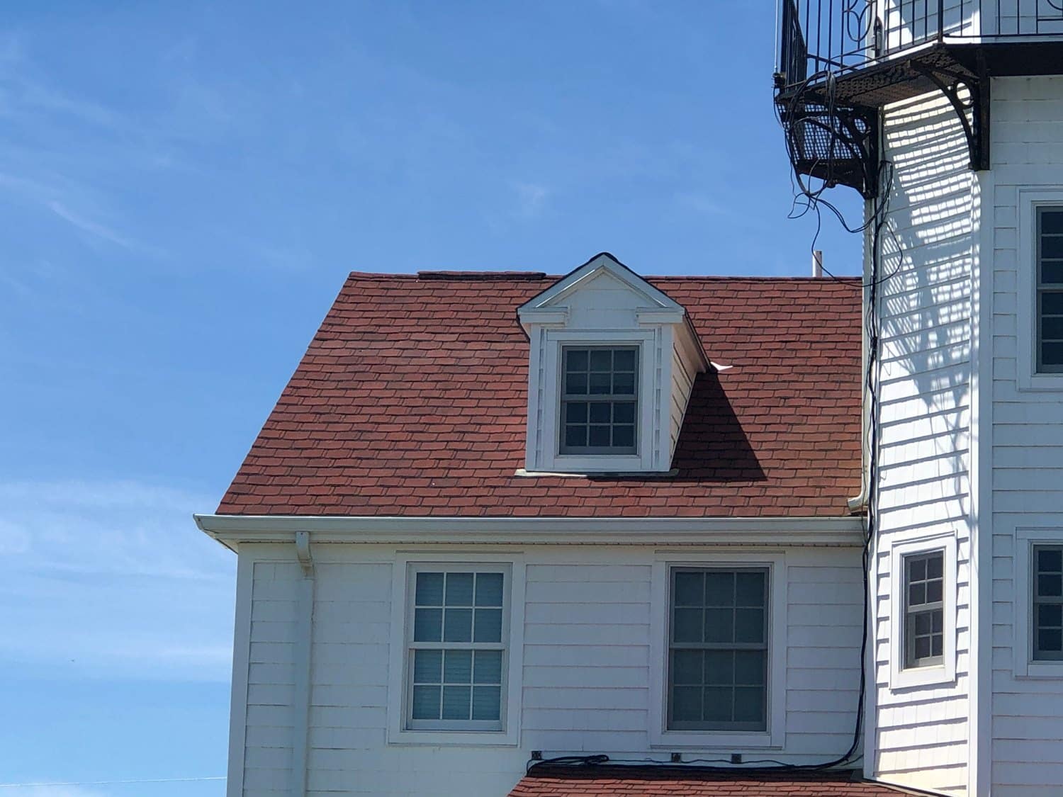 A Landmark Restored: CertainTeed Grand Manor Roofing on a Historic Narragansett Coastal Station