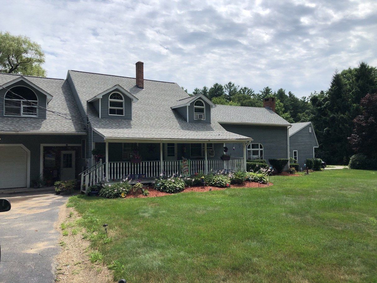 After — Manual-Venting Skylights on a North Smithfield Storm Re-Roof