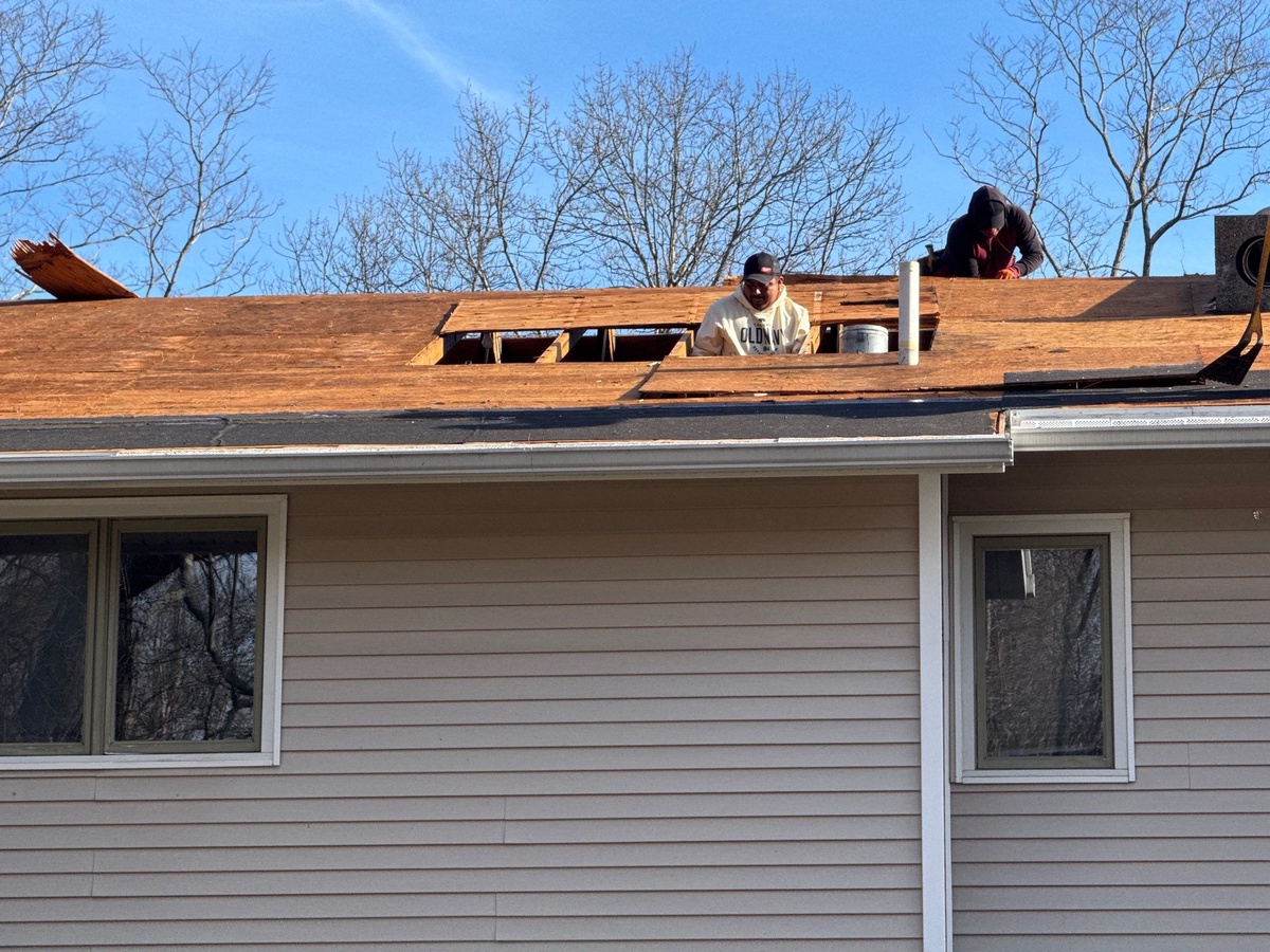 Showcase Project - CertainTeed Landmark North Kingstown RI - Inadequate original ridge vent removed — undersized for proper attic ventilation