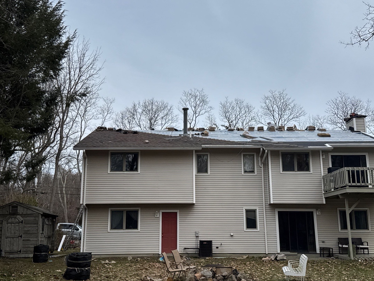 Showcase Project - CertainTeed Landmark North Kingstown RI - New plywood sheathing replacing compromised deck boards found during tear-off