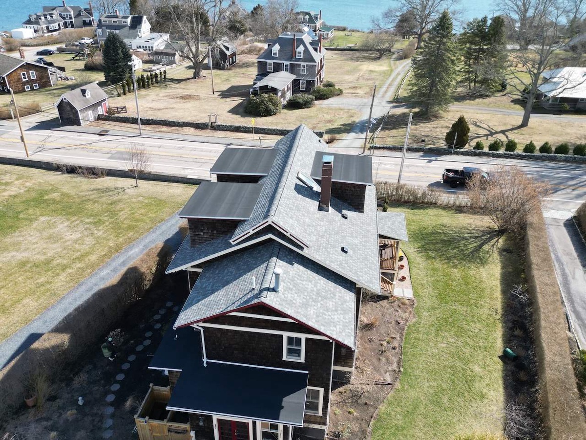 Showcase Project - CertainTeed Landmark PRO Jamestown RI - Low-slope section finished with CertainTeed Flintlastic SA modified bitumen in Charcoal