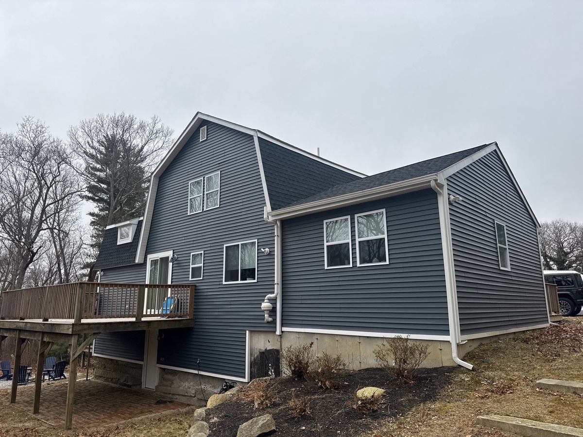 Showcase Project - GAF Timberline HDZ Johnston RI - Completed GAF Timberline HDZ roof in Charcoal showing clean lines at the mansard pitch change