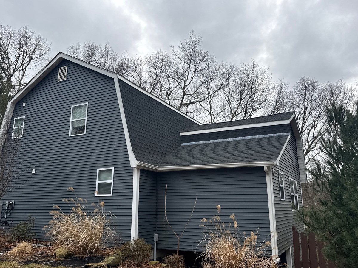 Showcase Project - GAF Timberline HDZ Johnston RI - GAF Timberline HDZ shingles with StrikeZone nailing area visible during installation