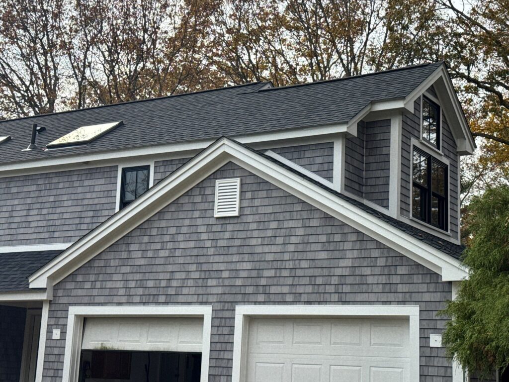 Completed CertainTeed Landmark PRO Moire Black + VELUX Skylights by Pinnacle Roofing in South Kingstown, Rhode Island