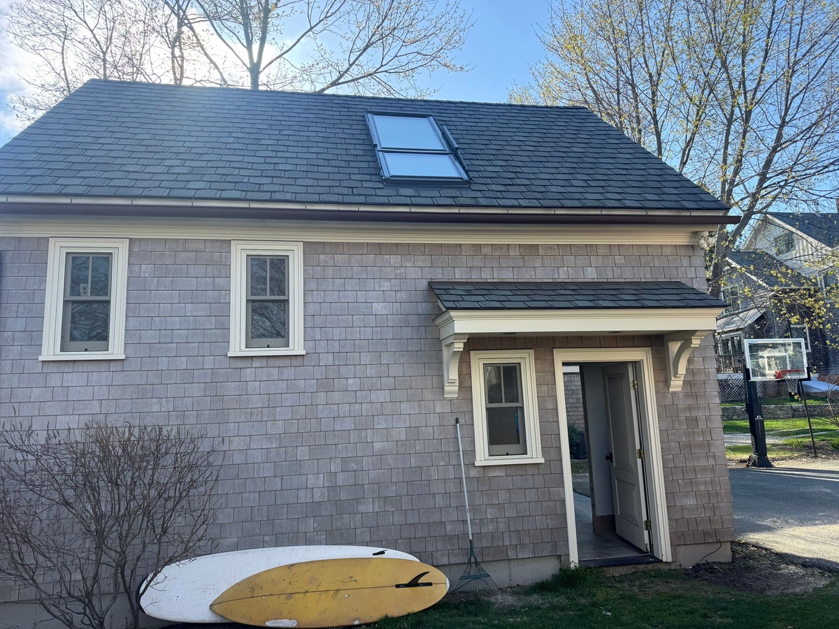 Showcase Project - VELUX Cabrio Balcony Jamestown RI - Cabrio in transition — top sash open, bottom panel beginning to extend outward