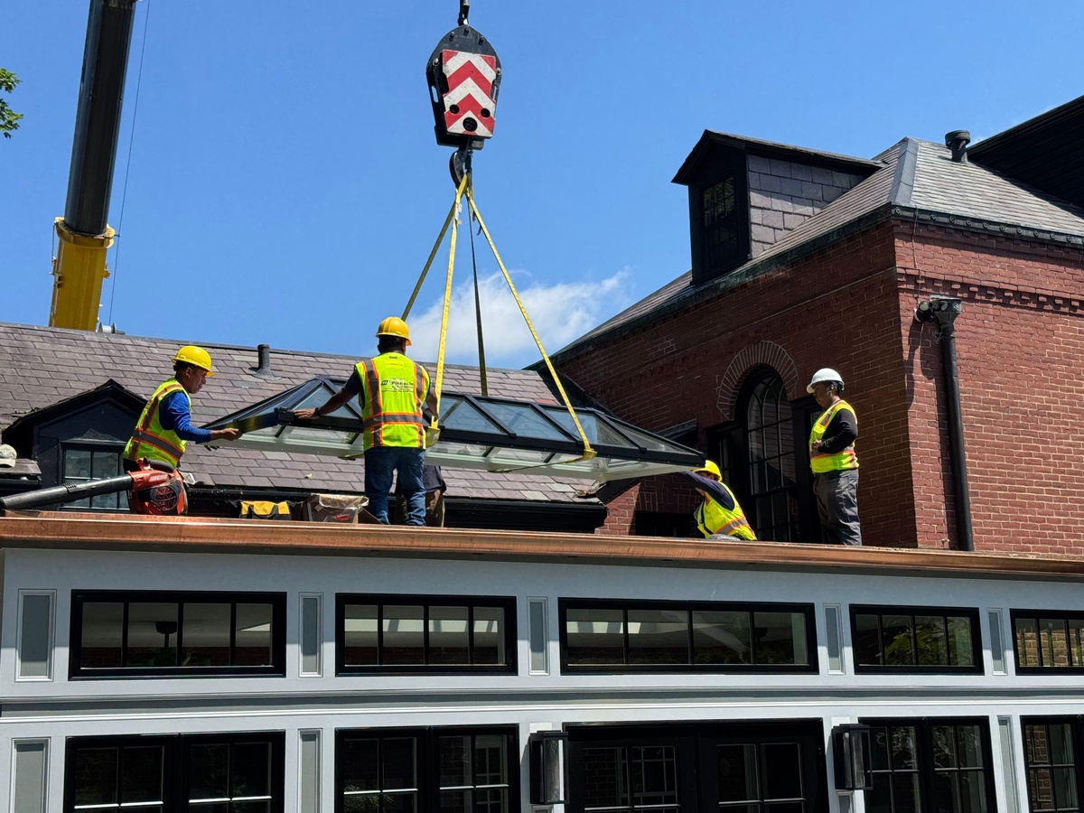 Showcase Project - VELUX Structural Skylight Providence RI - VELUX commercial flashing system being installed around the curb before roofing