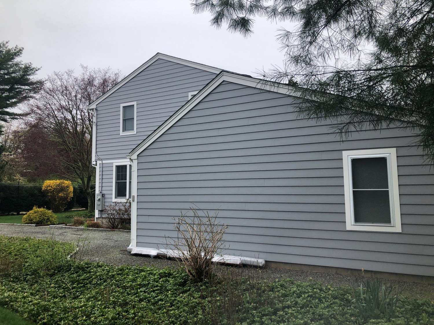 After — Everlast Composite Siding in Seaside Gray with an Owens Corning Duration Roof — South Kingstown