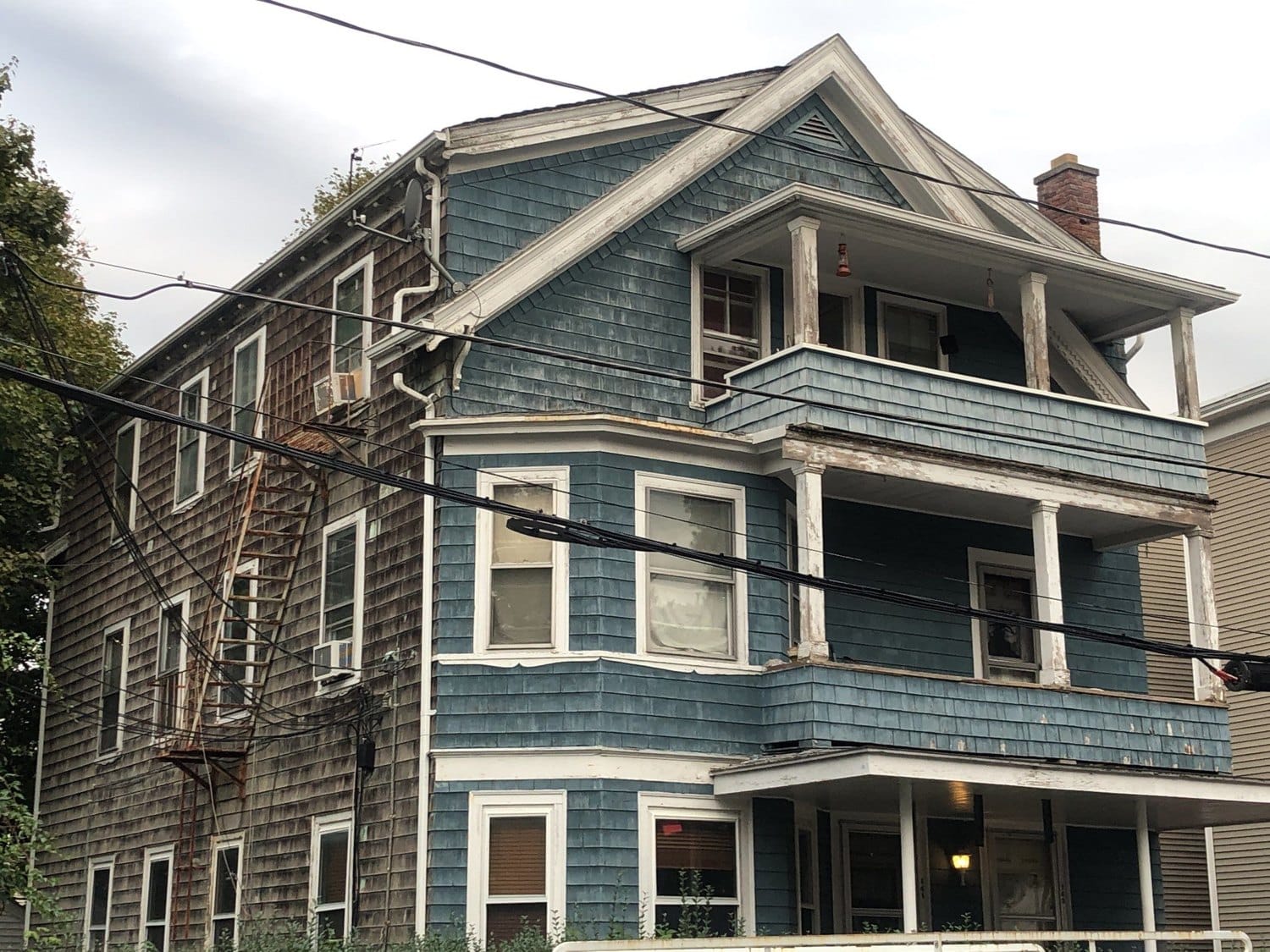 After — Multi-Family Roof Ventilation: A Landmark Silver Birch Roof on a Woonsocket Triple-Decker