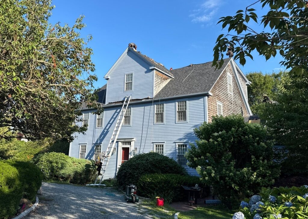 Roof replacement in Middletown, RI using CertainTeed Landmark PRO Moire Black shingles — Project #11601 by Pinnacle Roofing & Skylights