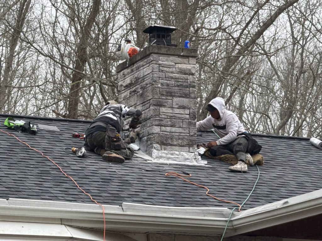 Flashing replaced on this chimney in Ashaway, RI, to prevent leaks and protect the roof from water damage.