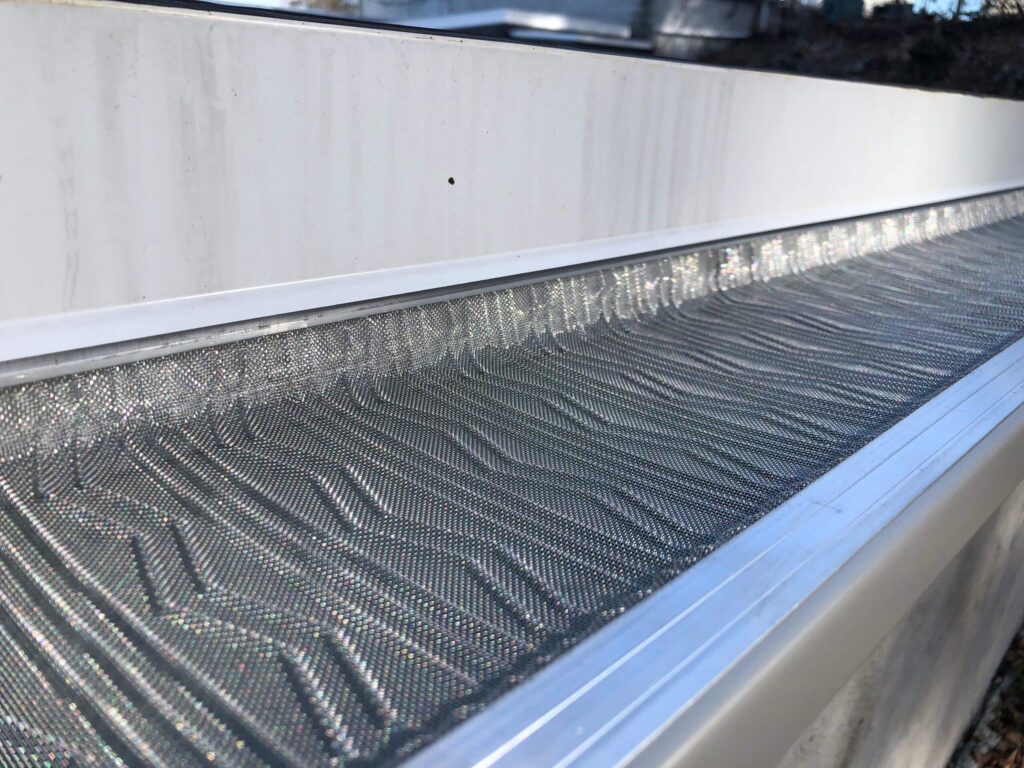 Gutter installation in Central Falls, RI — Project #11909 by Pinnacle Roofing & Skylights