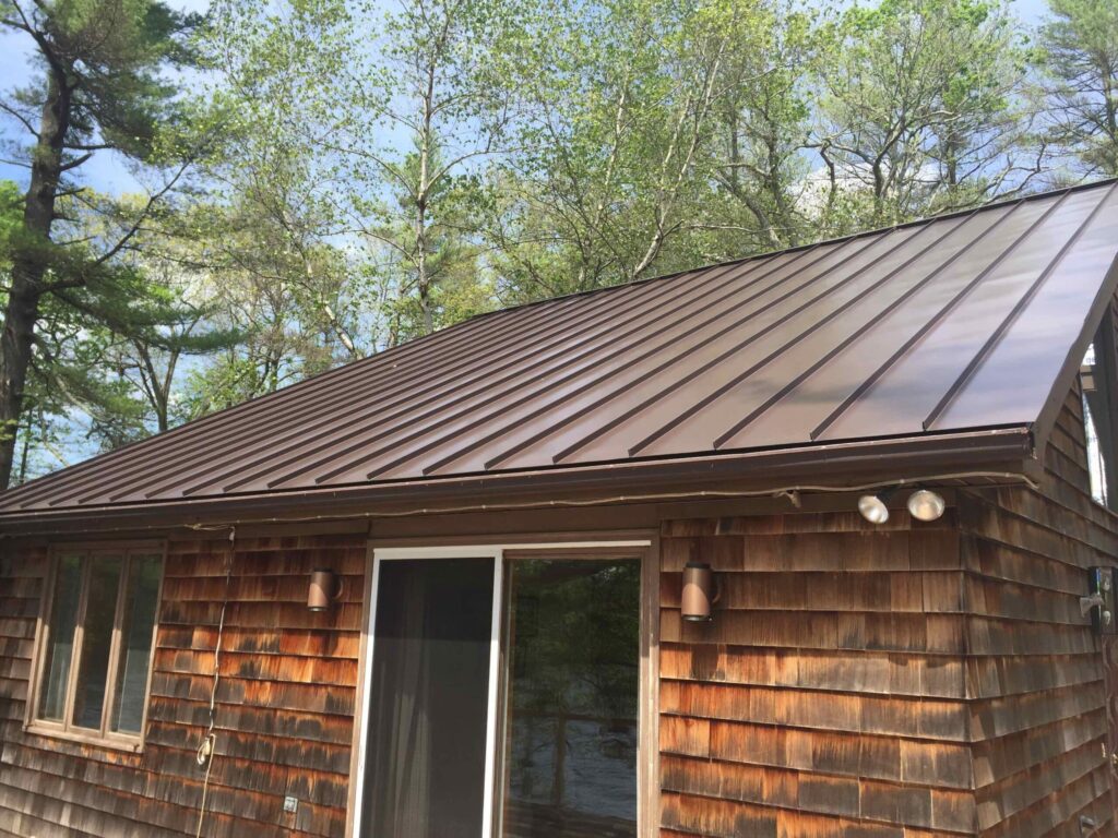 Roof replacement in Coventry, RI with metal — Project #12084 by Pinnacle Roofing & Skylights