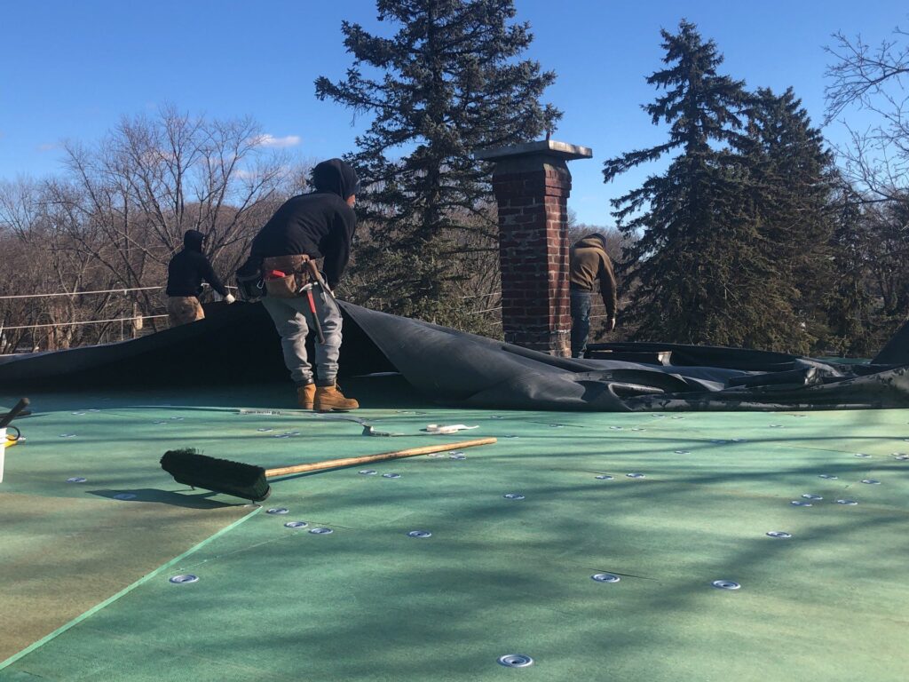Commercial roofing in Cumberland, RI with EPDM rubber membrane — Project #11763 by Pinnacle Roofing & Skylights