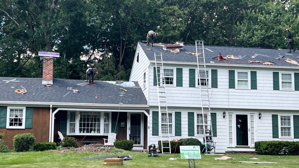 Roof replacement in East Greenwich, RI with asphalt shingles — Project #12059 by Pinnacle Roofing & Skylights