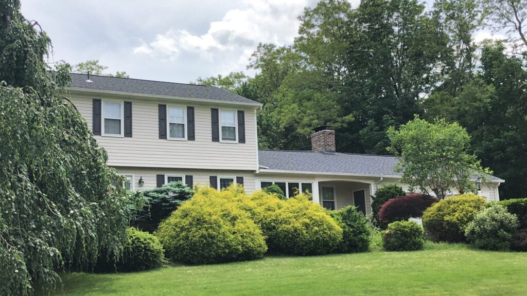 Roof replacement in East Greenwich, RI with asphalt shingles — Project #12221 by Pinnacle Roofing & Skylights