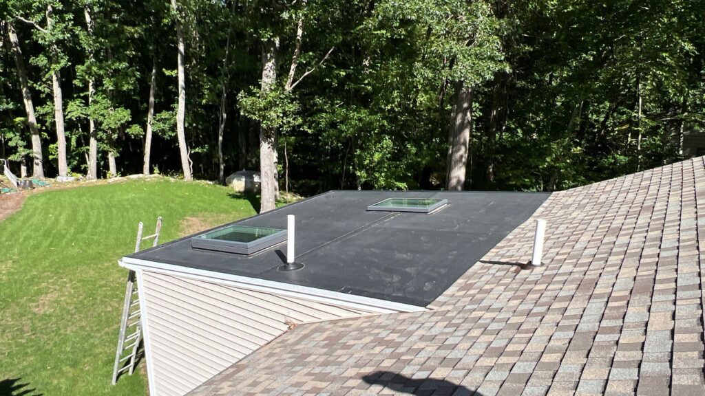 Skylight installation in East Greenwich, RI with VELUX skylights — Project #12268 by Pinnacle Roofing & Skylights