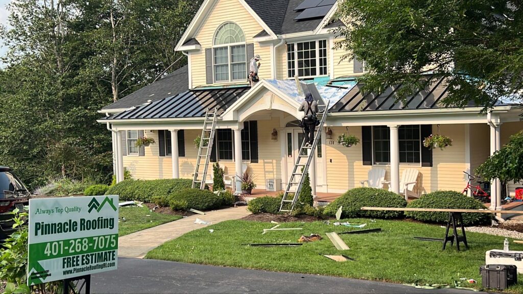 Roof replacement in East Greenwich, RI with metal — Project #12276 by Pinnacle Roofing & Skylights