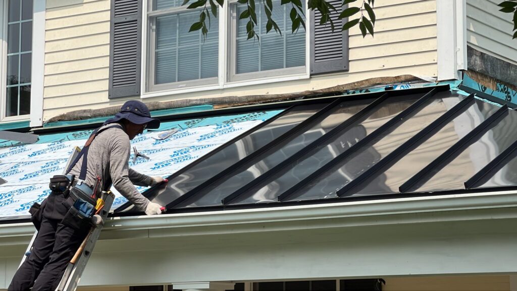 Roof replacement in East Greenwich, RI with metal — Project #12280 by Pinnacle Roofing & Skylights