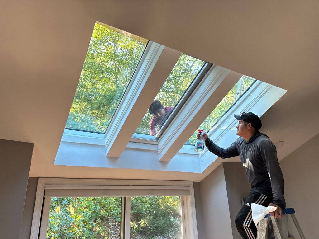Skylight installation in East Greenwich, RI with VELUX skylights — Project #12357 by Pinnacle Roofing & Skylights