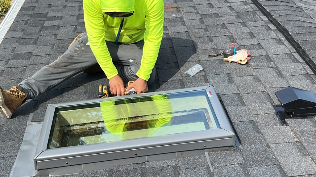 Skylight installation in East Greenwich, RI with VELUX skylights — Project #12363 by Pinnacle Roofing & Skylights