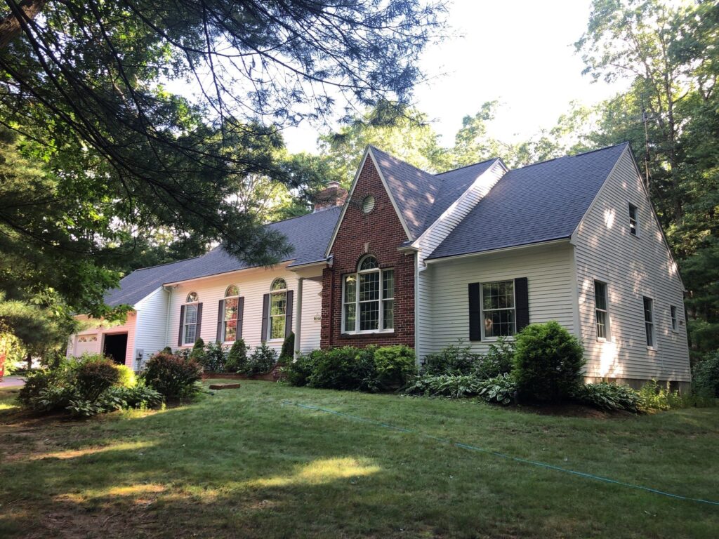 Roof replacement in Exeter, RI using CertainTeed Landmark PRO Charcoal Black shingles — Project #11640 by Pinnacle Roofing & Skylights