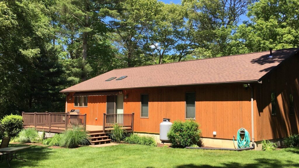 Roof replacement in Hope Valley, RI with VELUX skylights — Project #11921 by Pinnacle Roofing & Skylights