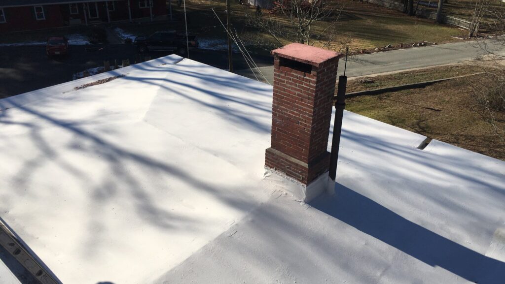 Commercial roofing in Hopkinton, RI with silicone coating — Project #11716 by Pinnacle Roofing & Skylights