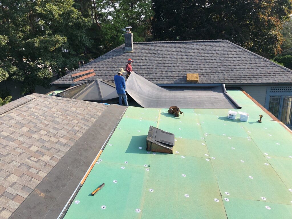 Roof replacement in Jamestown, RI with EPDM rubber membrane — Project #12319 by Pinnacle Roofing & Skylights